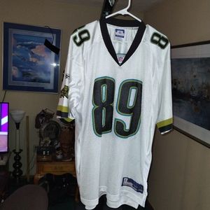 Mercedes Lewis number 89 on field Reebok football jersey